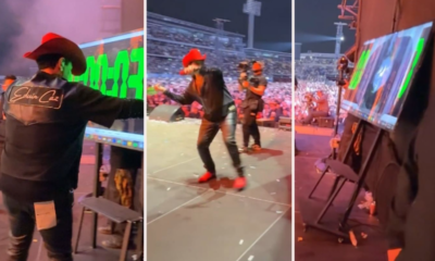 Eduin Caz rompe una pantalla del escenario durante el concierto de Grupo Firme en Colombia